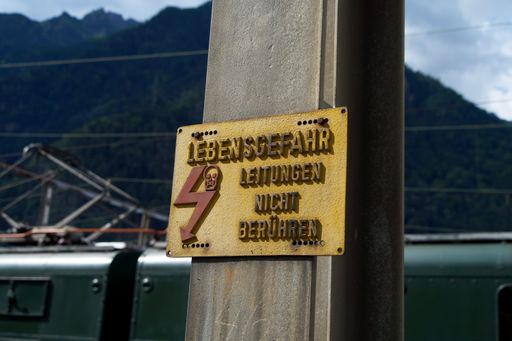 A warning sign in German
Translation: Danger to life, do not touch the cables