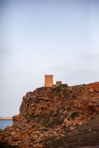 A vertical shot of the riviera beach landscape on a blue sky background in the early morning