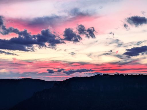 A mesmerizing view of a golden sunset over the mountain in Australia