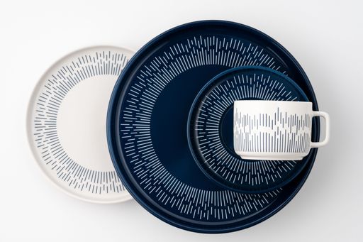 A set of blue and white luxury ceramic kitchen utensils on a white background.