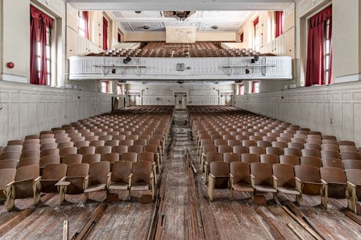 A theater with dilapidated floor