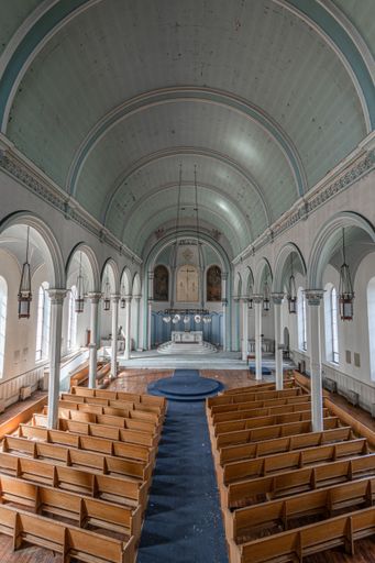 A vertical shot of the inner part of a church