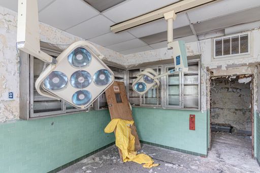A dilapidated hospital with broken lights