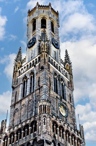 Belfort de Bruges or Belfry of Bruges one of the most iconic buildings in Europe. Medieval tower dominates the surroundings, in Market Square, Belgium
