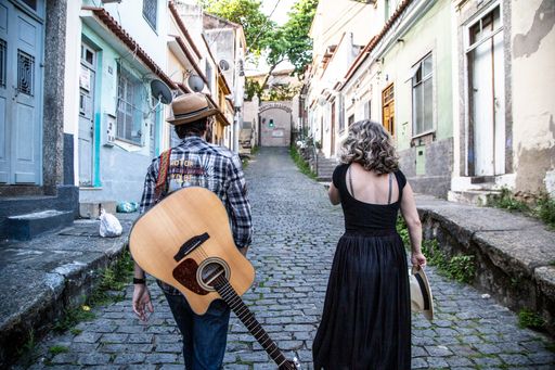 A beautiful shot of a couple walking on a street
