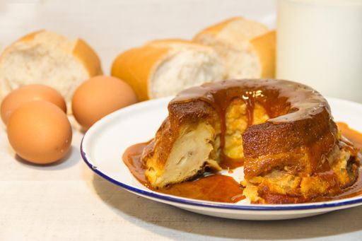 bread pudding made with stale bread, milk, eggs and sugar, decorated with liquid caramel and dulce de leche