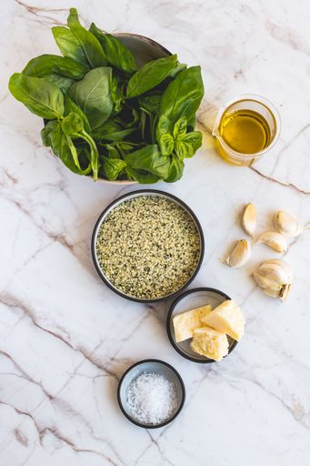 Hemp Pesto Ingredients on a marble surface