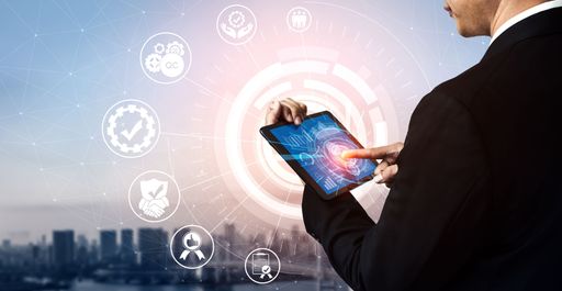 A businessman touching the tablet. Quality Assurance and Quality Control concept