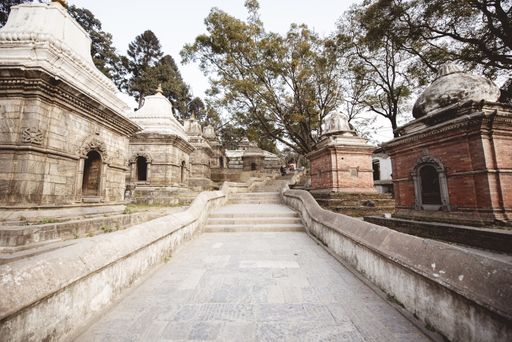 A staircase in the middle of small structures at a Hindu temple in Nepal