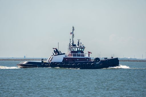 A closeup shot of a white ship sailing in the sea in Texas, USA