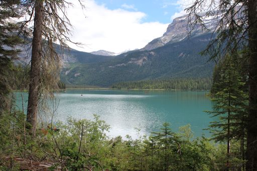 A scenic view of Emerald Lake and Canadian Rocky Mountains in Yoho National Park, British Colombia, Canada