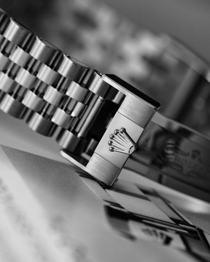The vertical closeup of the Rolex Explorer strap details