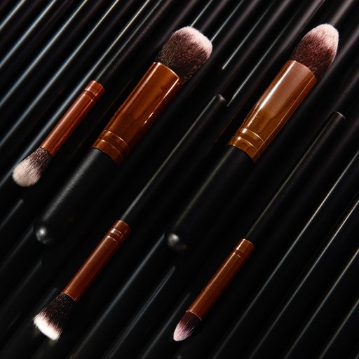 A closeup shot of makeup brushes