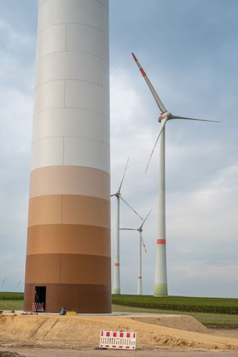 A view of wind turbines with wind turbine construction area in front