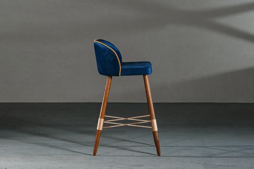 A comfy wing chair in the carpenter's workshop