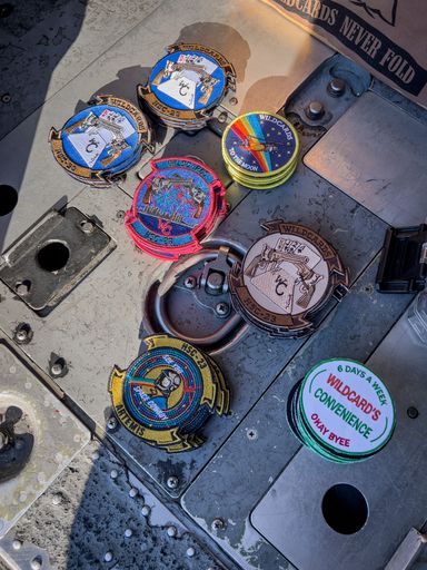 A closeup shot of United States Naval company patches in the back of a helicopter