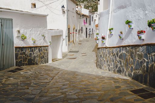 10-05-2022 parauta malaga , streets decorated with flowerpots white villages of andalucia