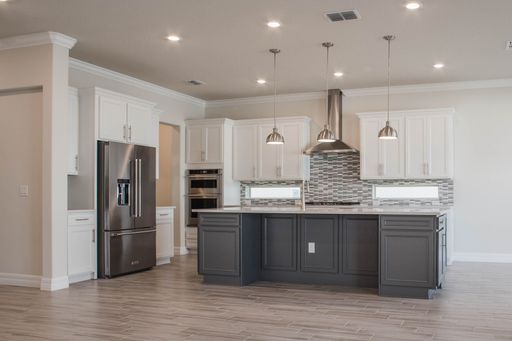 A modern interior of a kitchen in pastel colors