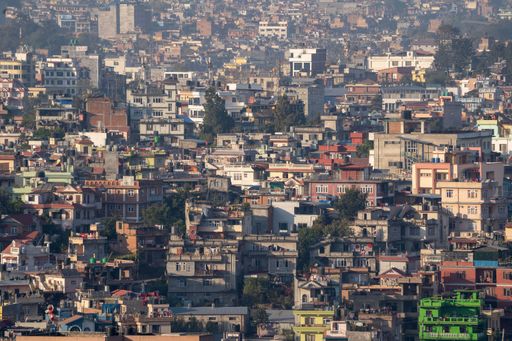 The cityscape of Kathmandu, Nepal surrounded by mountains