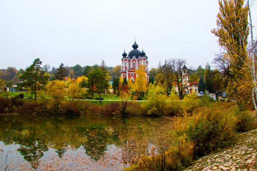A beautiful shot of the reflection of the famous Curchi Monastery in Moldova in the lake in front