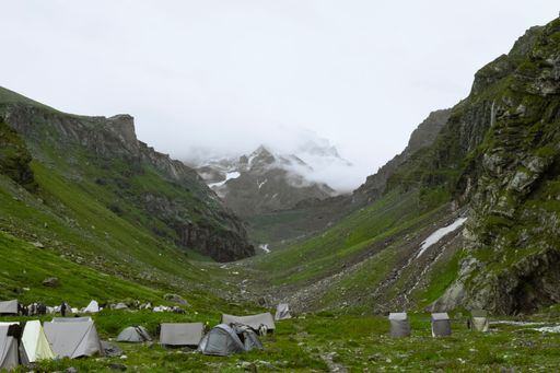 Camping tents on hills in Hampta Pass, India
