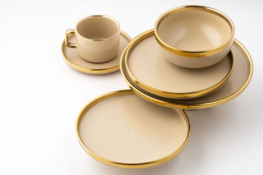 A Set of light brown ceramic plate and cup on a white background