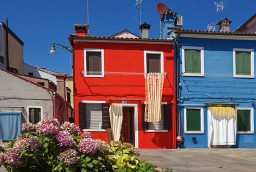 Typical brightly coloured/colored houses on Burano Island, Venice, Italy, on June 19, 2018.