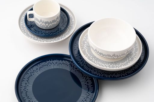 A set of blue and white luxury ceramic kitchen utensils on a white background