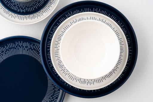 A set of blue and white luxury ceramic kitchen utensils on a white background
