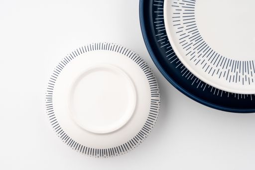 A set of blue and white luxury ceramic kitchen utensils on a white background