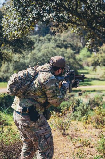 A vertical shot of military actions in the forest