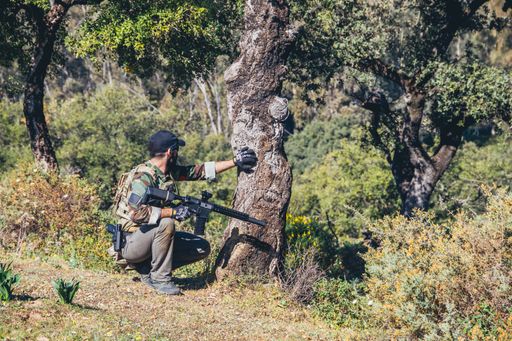 A closeup shot of military actions in the forest