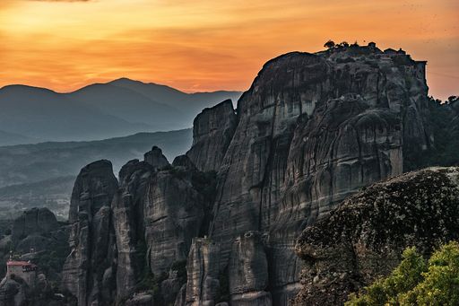 A breathtaking view of the cliffs with the beautiful sunset in the background