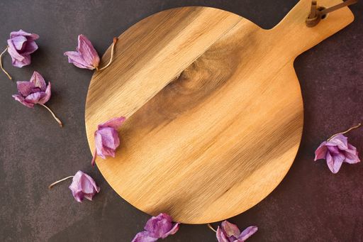 A top view of a rustic wooden podium decorated with dried lavender flowers