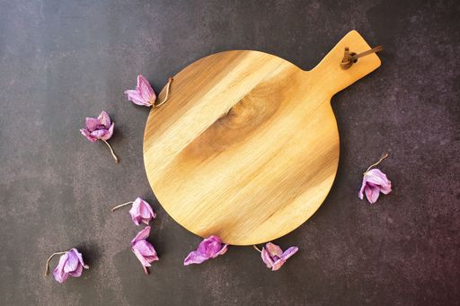 A top view of a rustic wooden podium decorated with dried lavender flowers