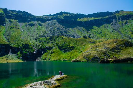landscape with Balea lake from Fagaras mountains - Romania. It is a glacial lake located at an altitude of 2034 m