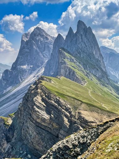 A vertical shot of the Seceda in the Dolomite Mountains in Val Gardena, Italy