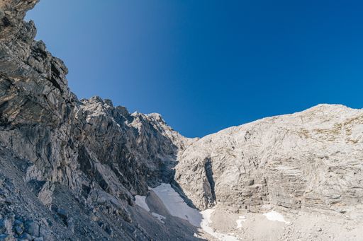 A low angle shot of a rock formation under the clear sky in Totes Gebirge, Austria
