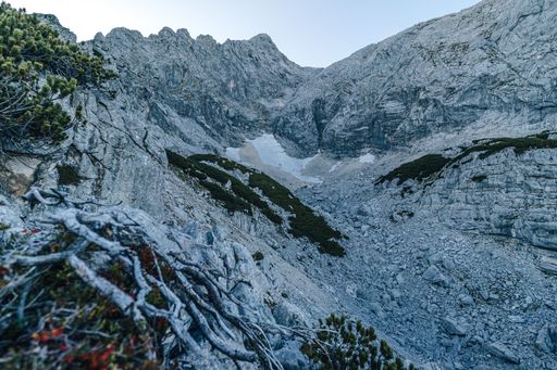 A low angle shot of a rock formation under the clear sky in Totes Gebirge, Austria