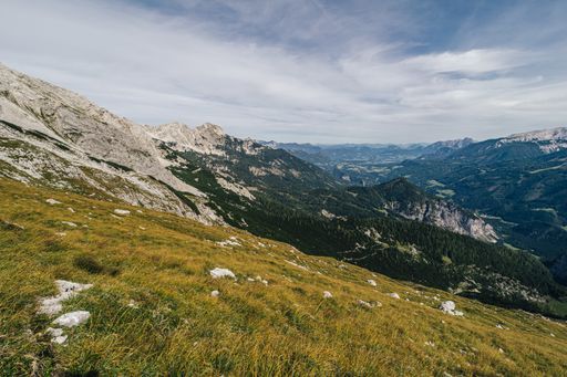 A low angle shot of a rock formation under the clear sky in Totes Gebirge, Austria