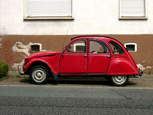 An old classic red car in Central Hesse