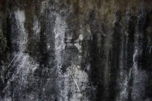 The gray grunge wall with cracks for backgrounds and overlays