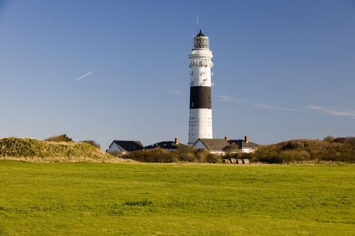 A beautiful shot of a lighthouse in the Sylt Island in Germany on a cloudy day