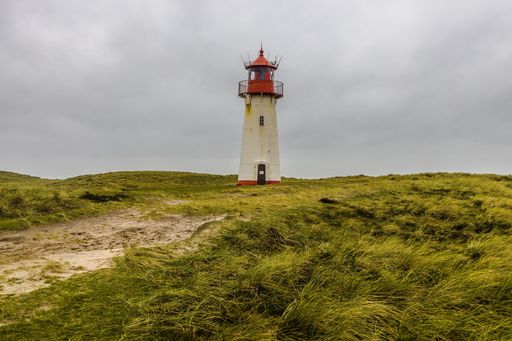 A beautiful shot of a lighthouse in the Sylt Island in Germany on a cloudy day