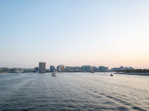 A view of Al Raha Beach, Abu Dhabi, UAE at sunset taken from Yas Island