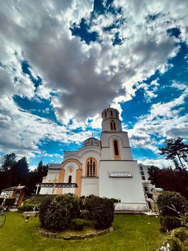A low angle shot of St. Archangel Michael church against a cloudy sky in Skopje, North Macedonia