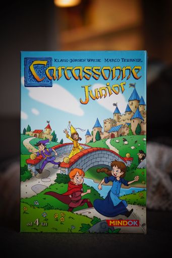 A closeup of Carcassonne Junior card game box