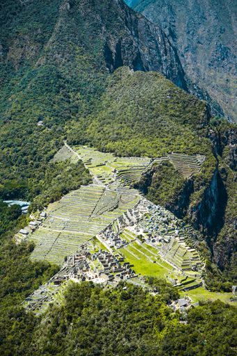 A vertical aerial view of the historic Machu Picchu in Peru