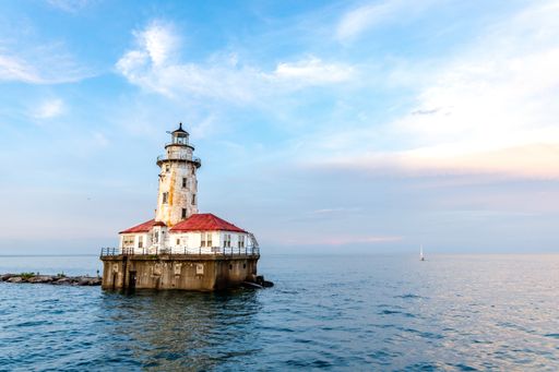 The Chicago Harbor Lighthouse under the cloudy sky