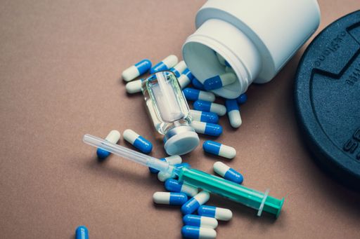 A closeup of medicine treatment or illegal doping in sports
